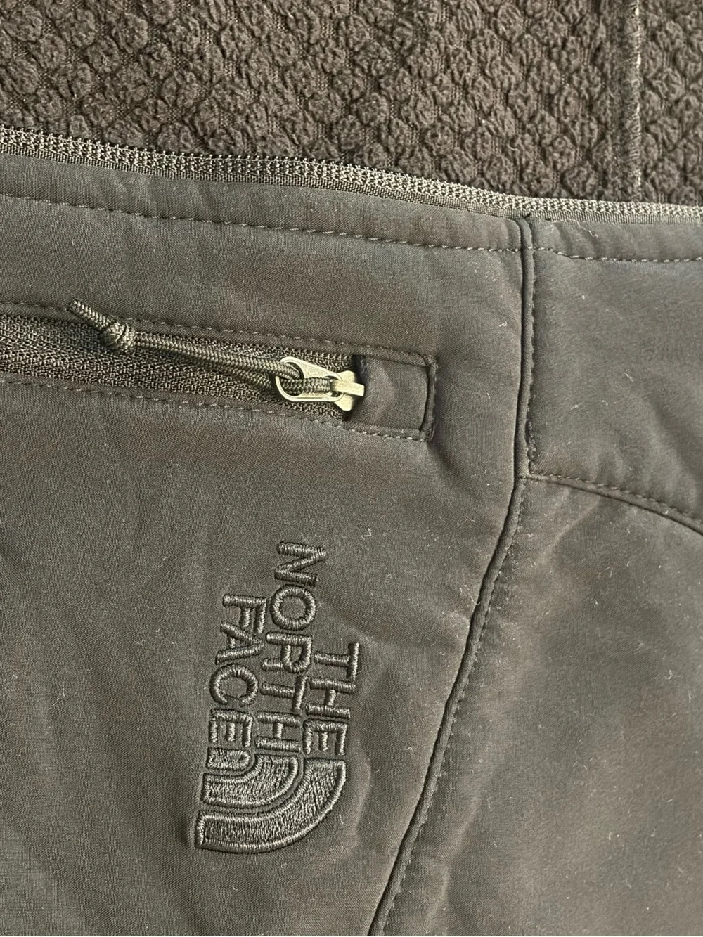 The North Face Black Softshell Men's Vest with Zip Pockets